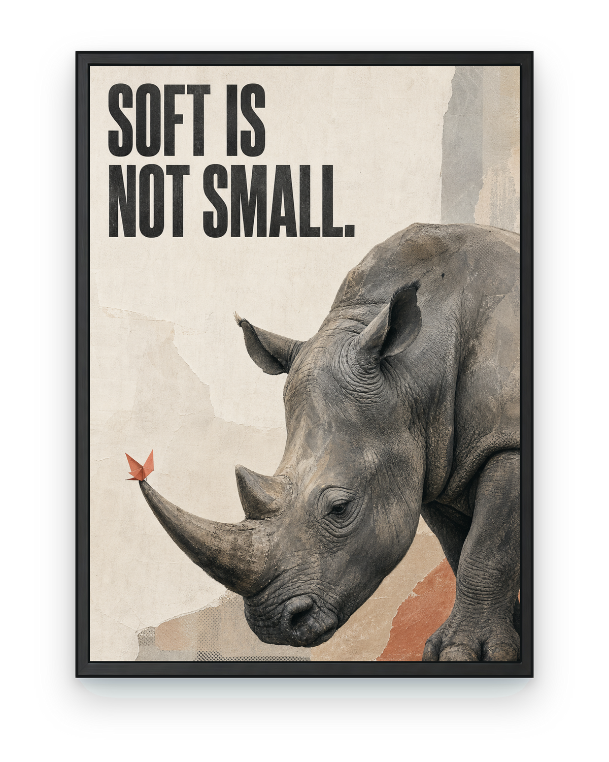 Soft Is Not Small rhino art print with the full headline visible in a black frame.