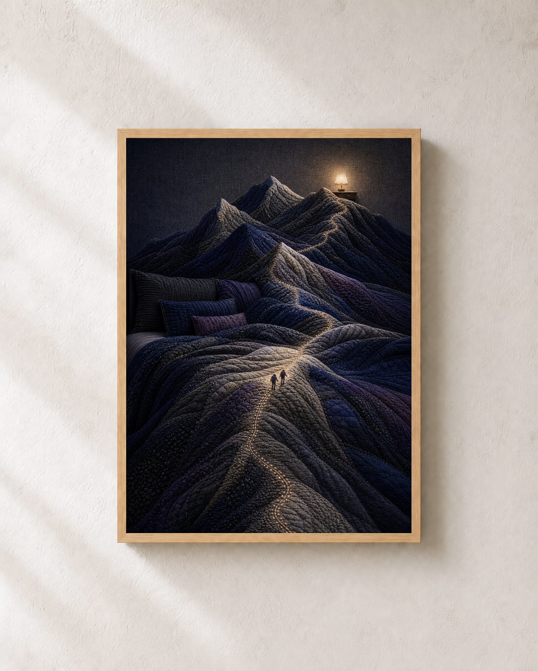 The Bed Became Mountains art print in a light oak frame